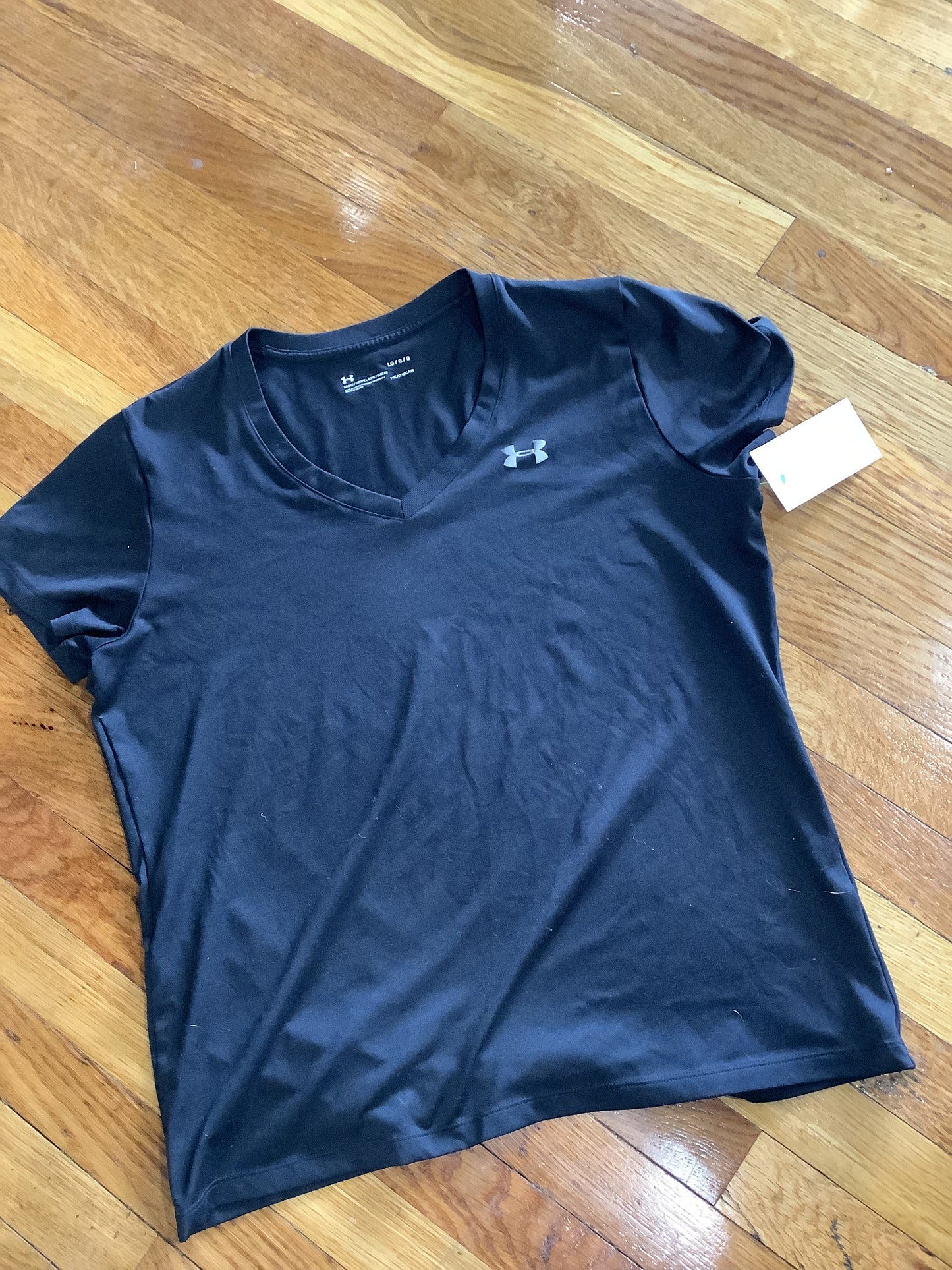 Women’s Large UA Dri Fit shirt